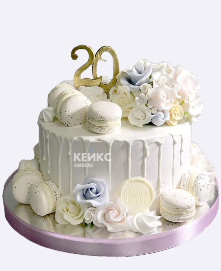 Нежно белый торт на 20 лет с макарунс и цветами Нежно белый торт на 20 лет с макарунс и цветами Фото