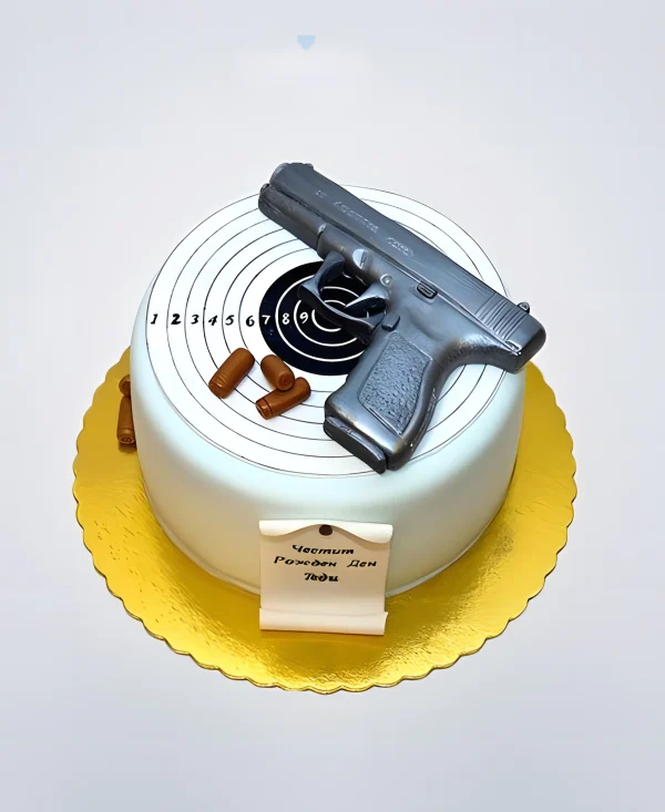 Торт пистолет с мишенью, пистолетом и пулями Фото