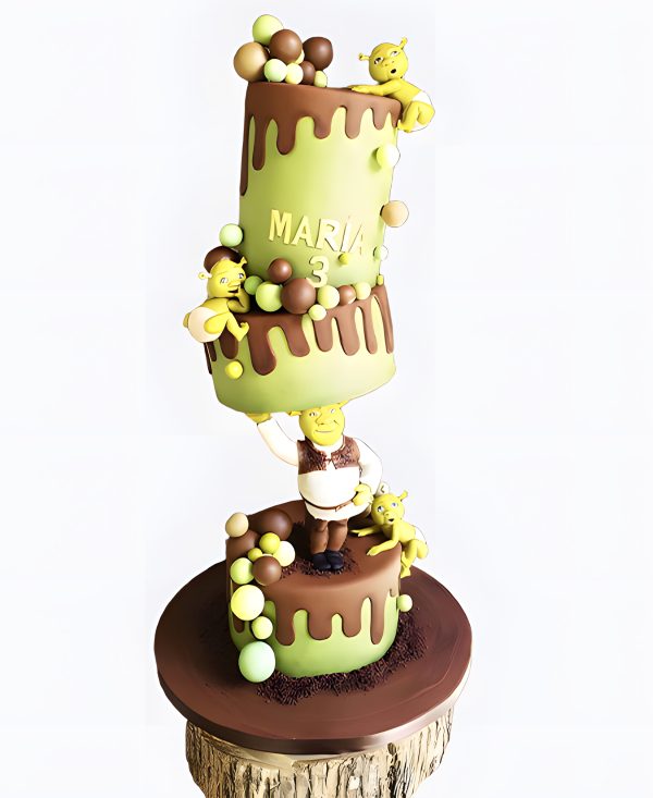 Удивительный торт с фигурками семьи Шрека Фото