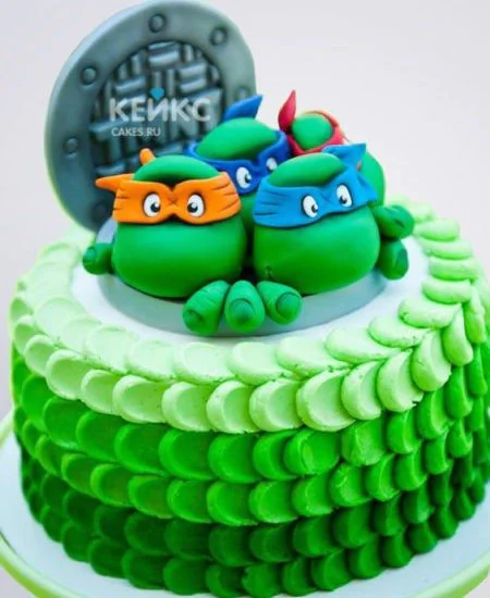 Детский торт в виде черепашек Ниндзя, выглядывающих из люка Фото