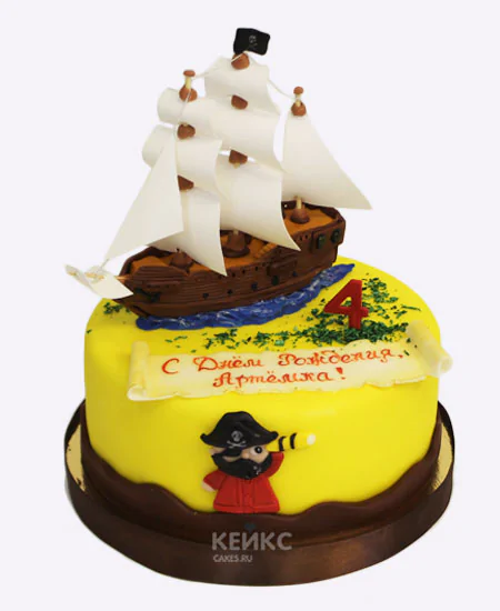 Яркий торт с пиратским кораблем Яркий торт с пиратским кораблем Фото