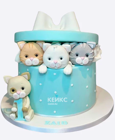 Торт девочке в виде голубой коробки с котиками Фото
