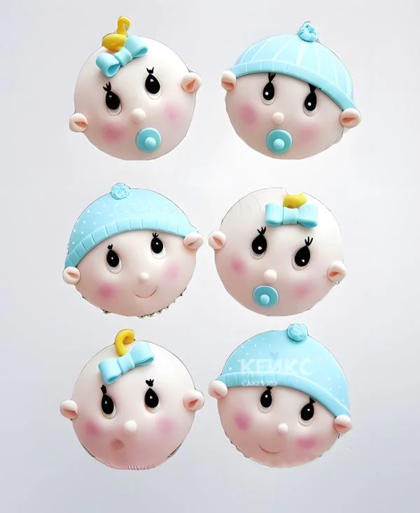 Капкейки в виде малышей на рождение Фото