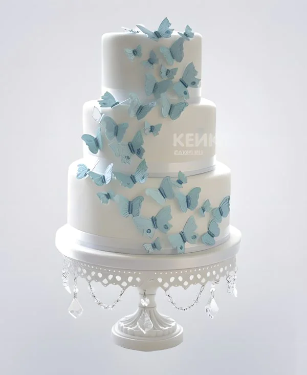 Свадебный торт белый с голубыми бабочками Свадебный торт белый с голубыми бабочками Фото