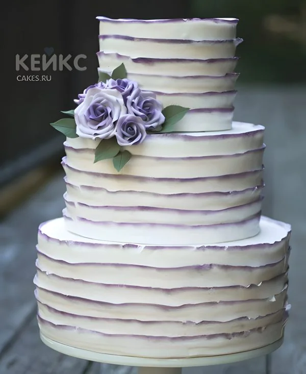 Трехъярусный свадебный торт с синими розами Трехъярусный свадебный торт с синими розами Фото