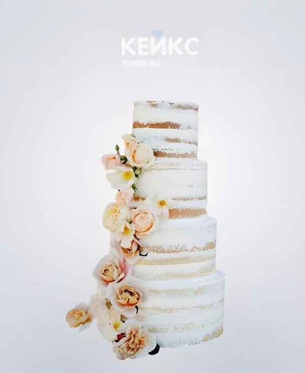 Высокий свадебный торт украшенный водопадом живых цветов Высокий свадебный торт украшенный водопадом живых цветов Фото