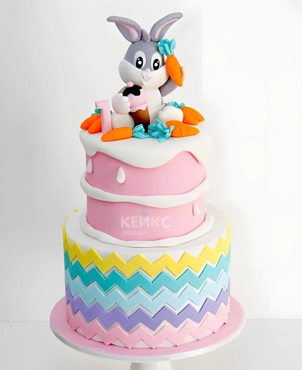 Розовый двухъярусный торт с зайцем  и морковками Розовый двухъярусный торт с зайцем  и морковками Фото