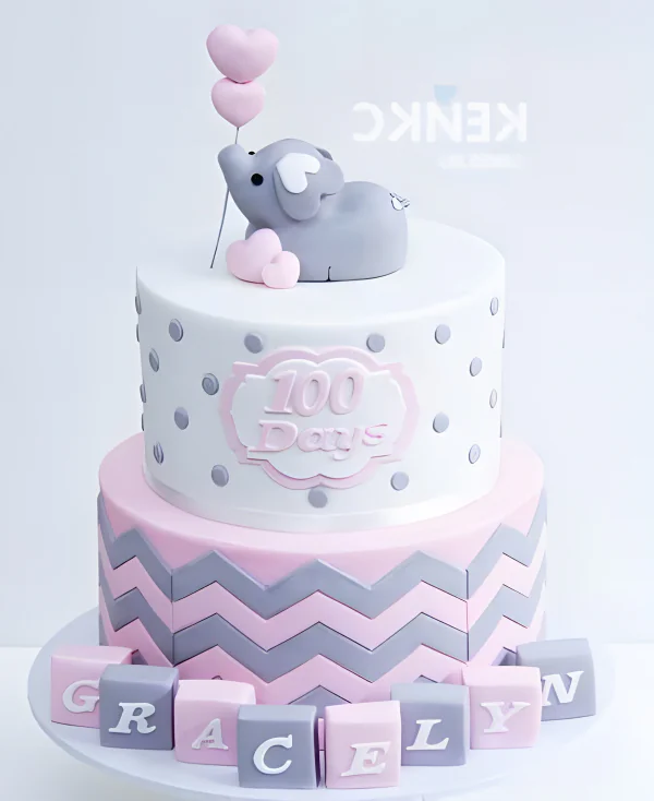 Розовый торт со слоненком и зигзагами Фото