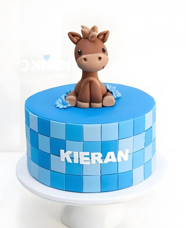 Синий торт с фигуркой жирафа Фото