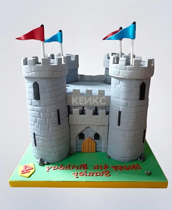 Торт в виде крепости с флагами и надписью Торт в виде крепости с флагами и надписью Фото