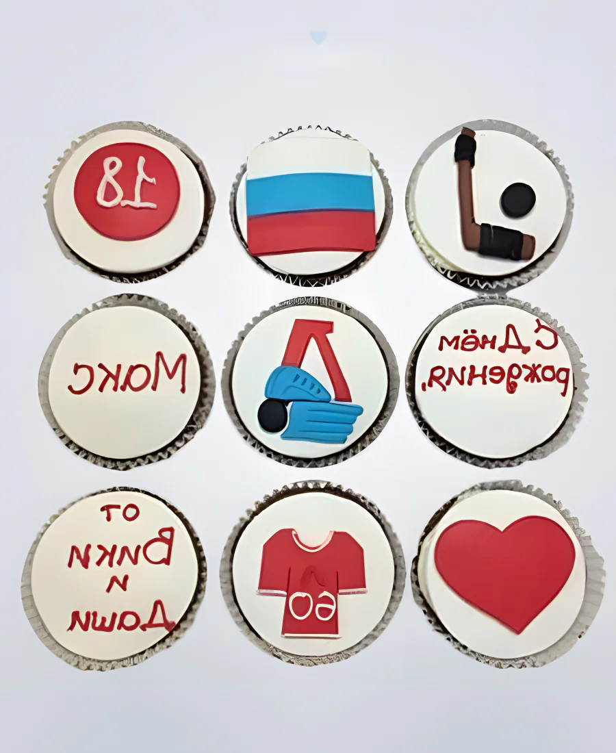 Капкейки хоккей в красно-белых цветах Капкейки хоккей в красно-белых цветах Фото