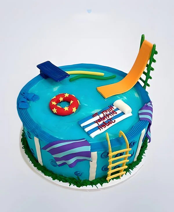 Озорной торт бассейн с желтой горкой и кругом Озорной торт бассейн с желтой горкой и кругом Фото