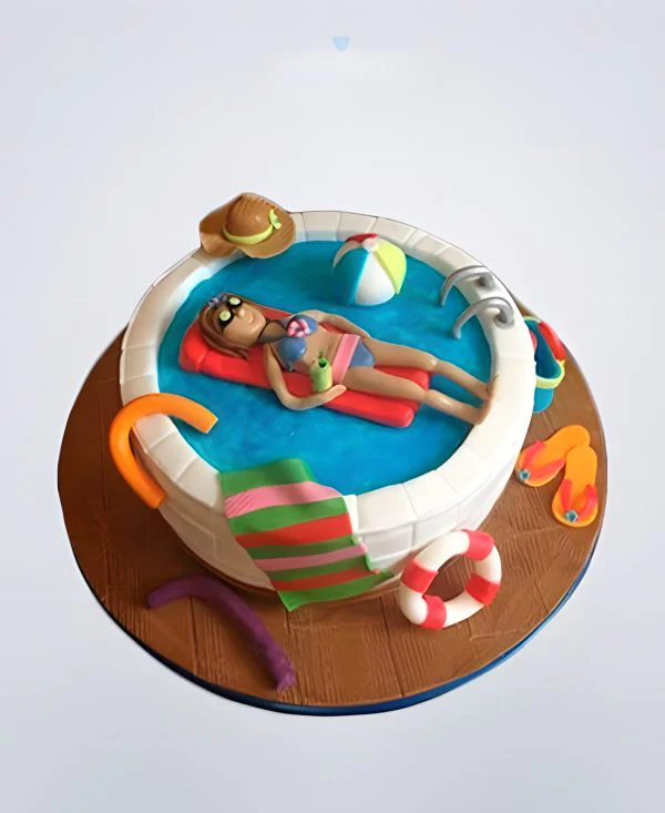Торт бассейн с девушкой на матрасе Торт бассейн с девушкой на матрасе Фото