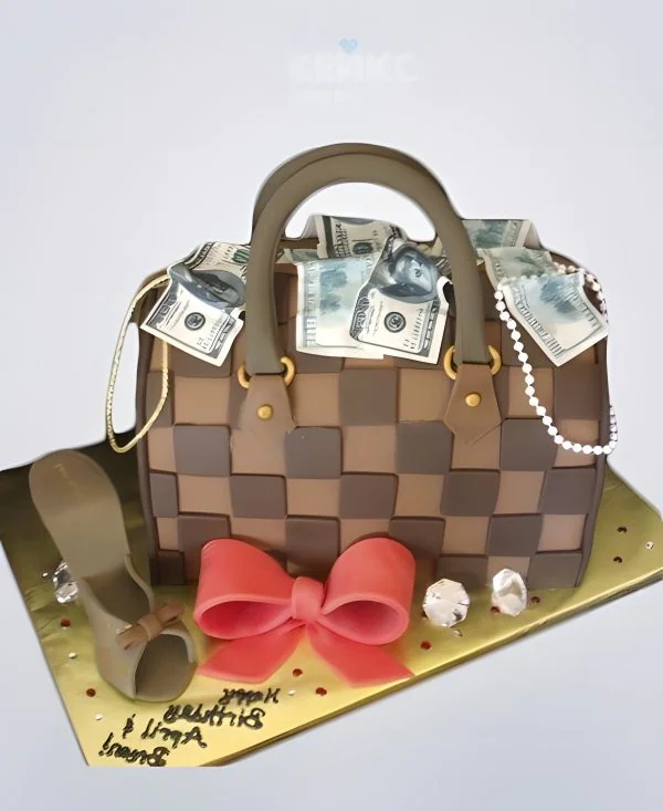 Торт в виде сумки с деньгами и бантом Торт в виде сумки с деньгами и бантом Фото