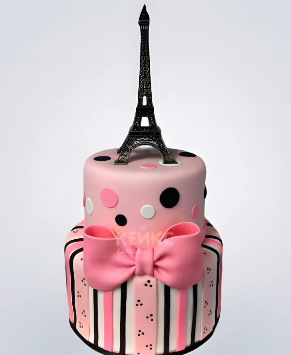 Торт Эйфелева башня с романтичным розовым бантом Торт Эйфелева башня с романтичным розовым бантом Фото