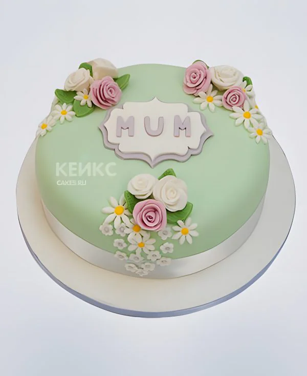 Скромный зеленый торт с цветами Фото