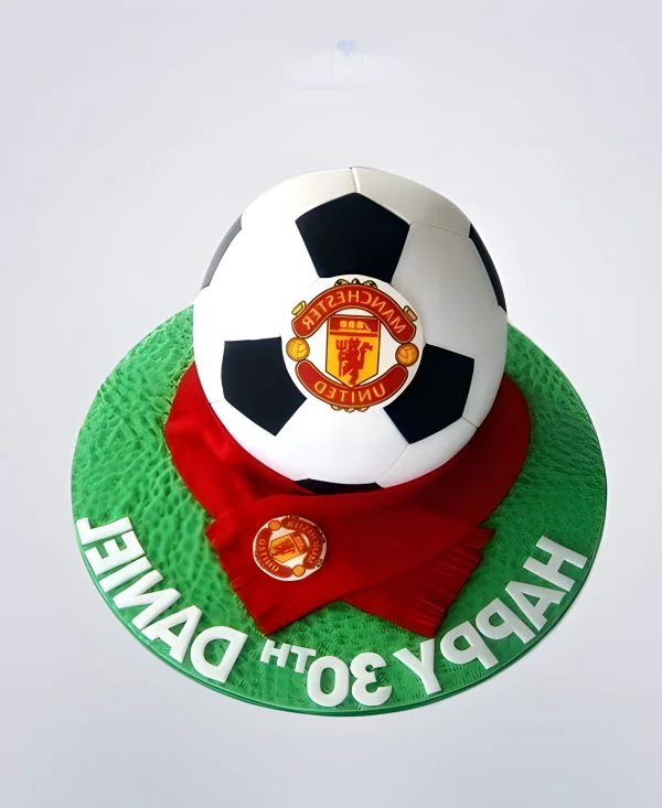Торт Манчестер Юнайтед с мячом и эмблемой Торт Манчестер Юнайтед с мячом и эмблемой Фото