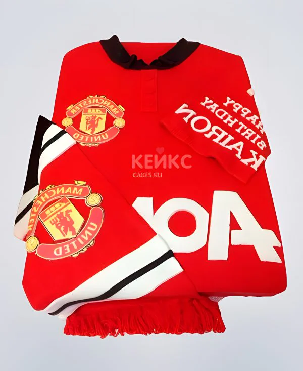 Красный торт в виде поло с логотипом Манчестер Юнайтед Красный торт в виде поло с логотипом Манчестер Юнайтед Фото