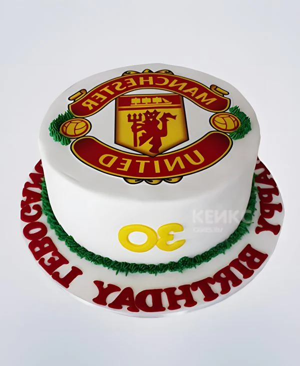 Белый торт Манчестер Юнайтед с надписью и логотипом Белый торт Манчестер Юнайтед с надписью и логотипом Фото