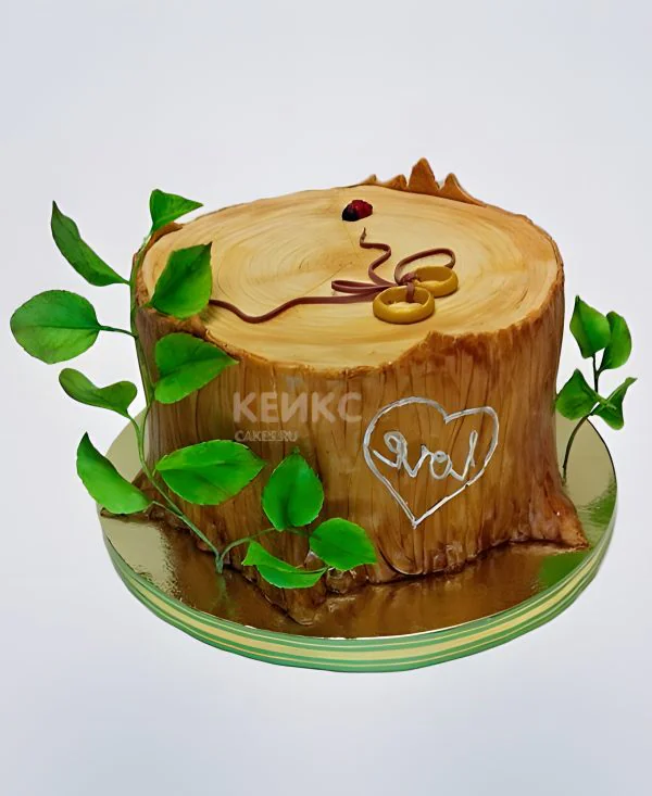 Торт на деревянную свадьбу с кольцами для молодожёнов Торт на деревянную свадьбу с кольцами для молодожёнов Фото