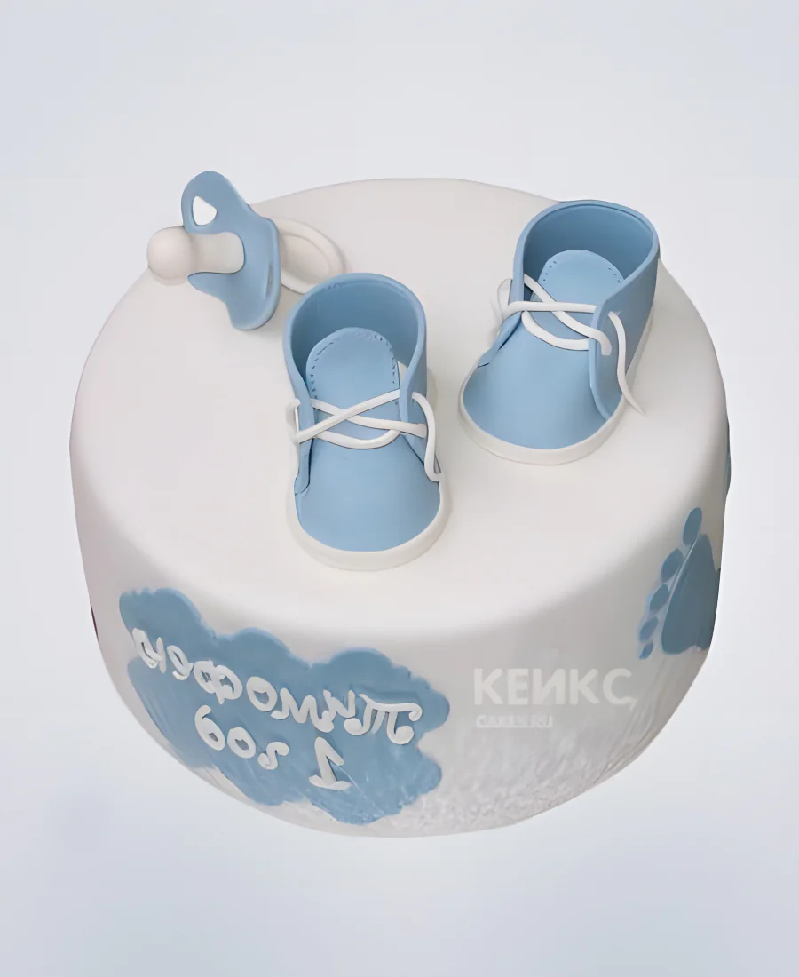 Торт с голубыми ботинками и соской Торт с голубыми ботинками и соской Фото