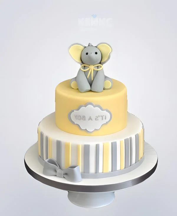 Полосатый желтый торт со слоненком Полосатый желтый торт со слоненком Фото