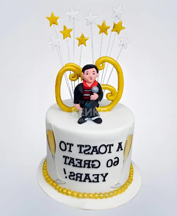 Белый торт с бокалами и звездами Белый торт с бокалами и звездами Фото