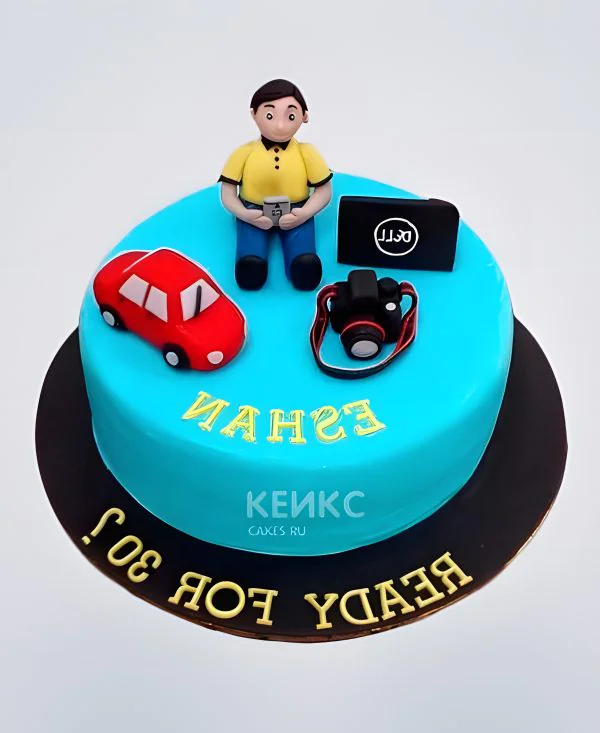 Торт голубой с фотоаппаратом и красной машиной Торт голубой с фотоаппаратом и красной машиной Фото