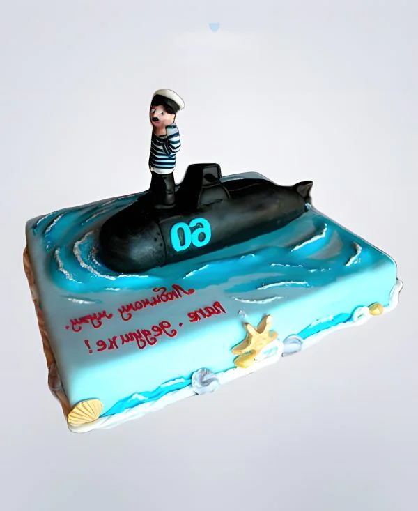 Квадратный торт в виде моря с подводной лодкой и матросом Квадратный торт в виде моря с подводной лодкой и матросом Фото
