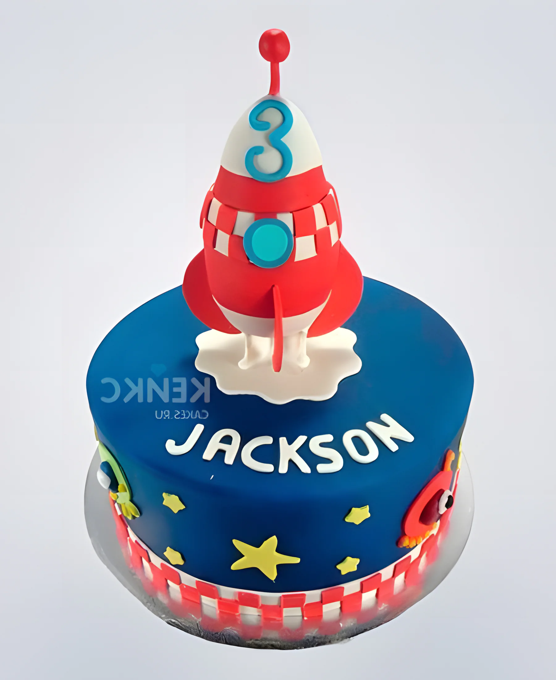 Синий торт с фигуркой ракеты и звездами Фото