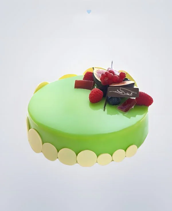 Зеленый зеркальный торт с ягодами Зеленый зеркальный торт с ягодами Фото