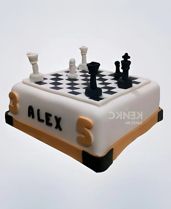 Торт с шахматными фигурами и доской Фото