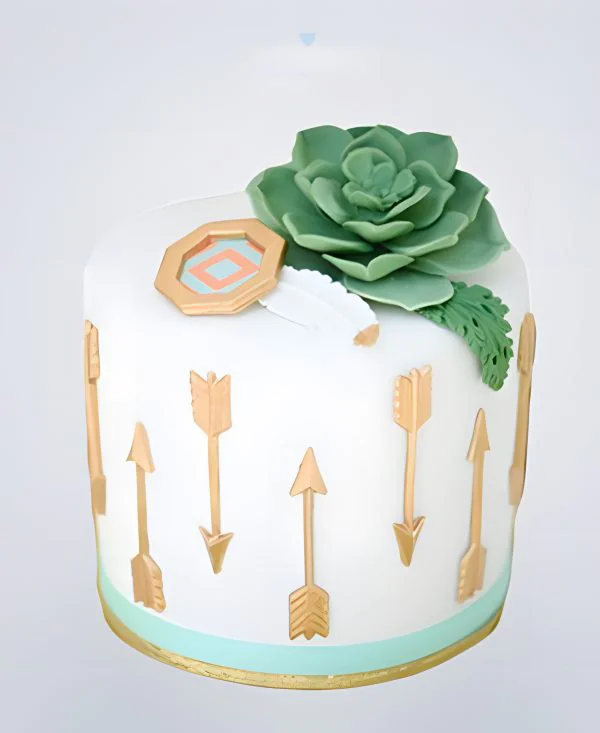 Свадебный торт в стиле бохо со стрелами и цветком Фото