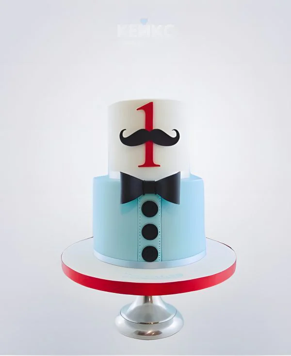 Бело-голубой торт с галстуком бабочкой и усами Бело-голубой торт с галстуком бабочкой и усами Фото