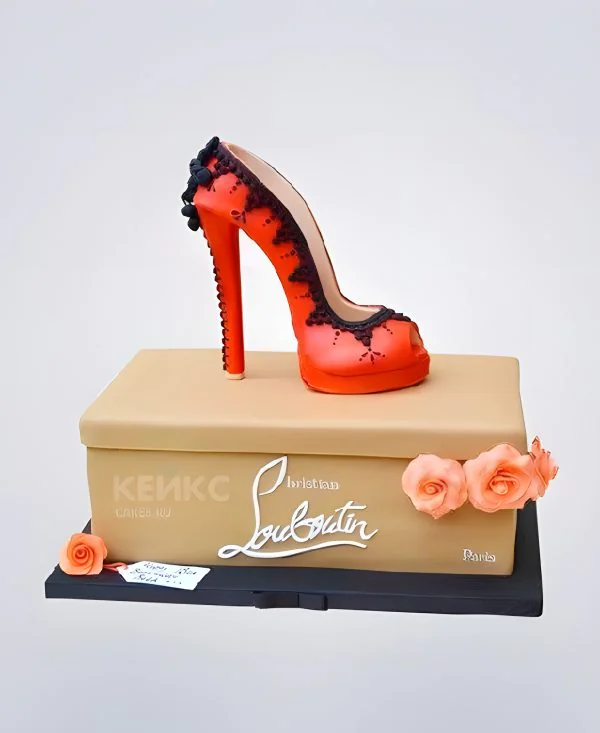 Торт в виде красной туфельки с черными бусинами Торт в виде красной туфельки с черными бусинами Фото