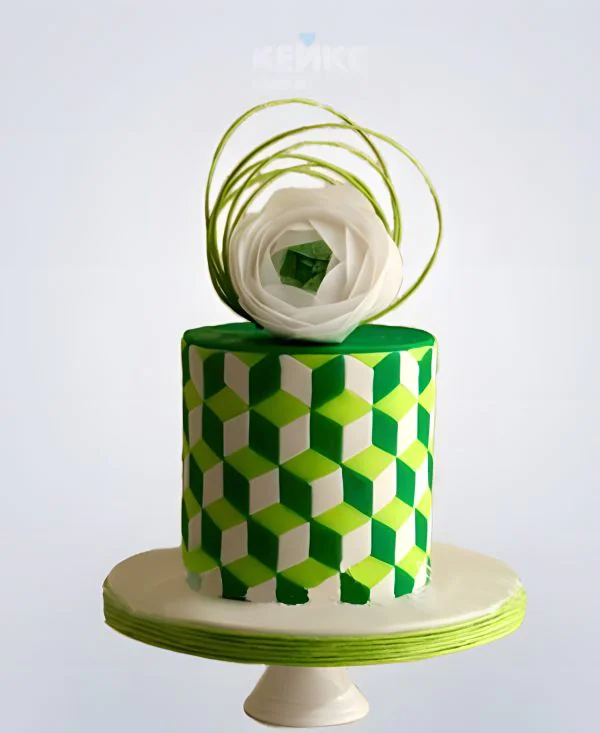 Торт в зеленых тонах с графическим рисунком и цветком Торт в зеленых тонах с графическим рисунком и цветком Фото