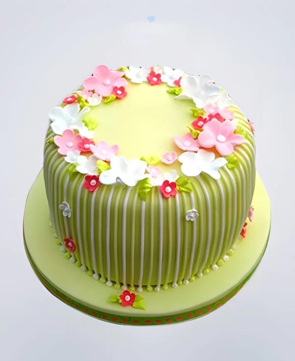 Зеленый торт с цветами Зеленый торт с цветами Фото