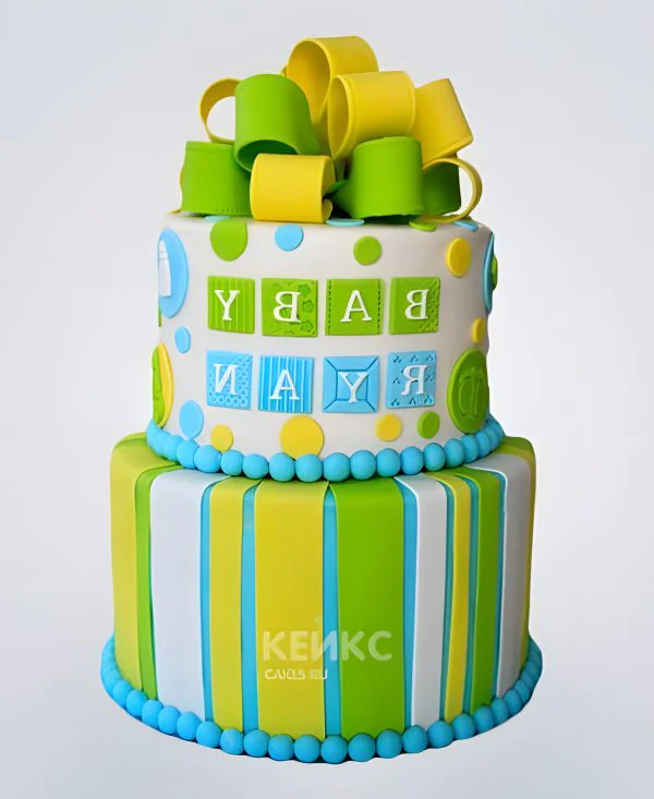 Торт желто-зеленый с бантом из мастики Фото