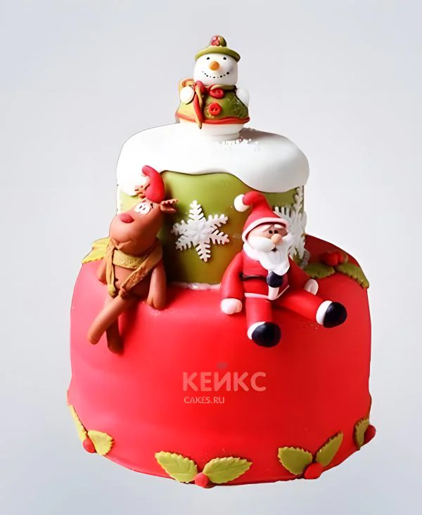 Яркий зимний торт с фигурками из мастики Фото