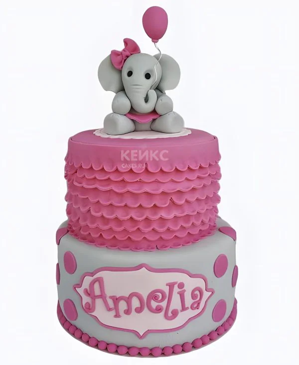Яркий розовый торт с фигуркой слоника Яркий розовый торт с фигуркой слоника Фото