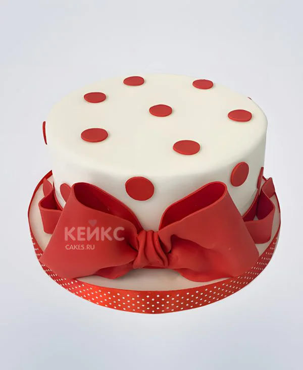 Торт в красный горошек с бантом Фото