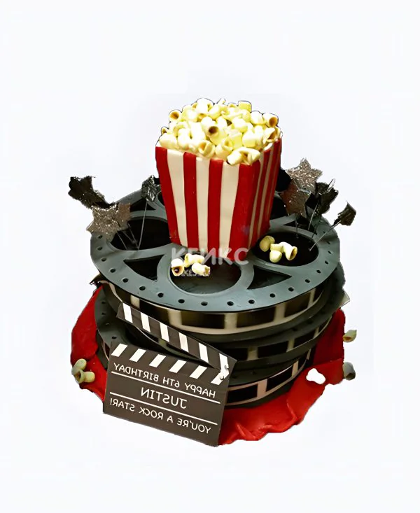 Торт в виде кинопленки с пачкой попкорна Фото