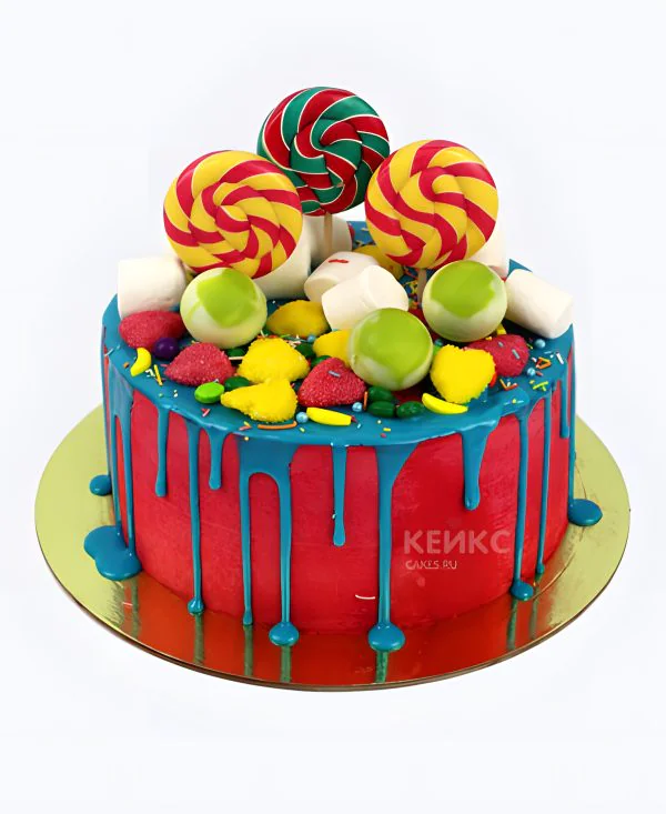 Торт с синей глазурью и яркими сладостями Торт с синей глазурью и яркими сладостями Фото
