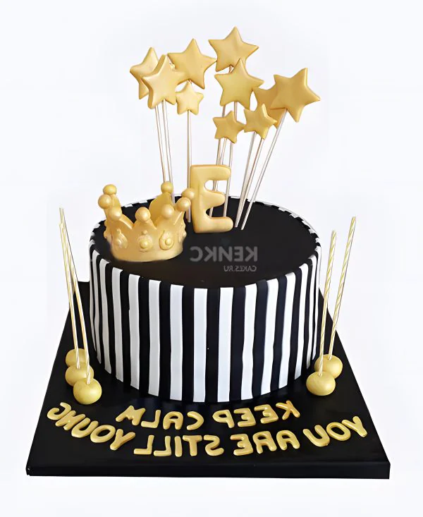 Черно-белый полосатый торт с золотыми звездами Черно-белый полосатый торт с золотыми звездами Фото