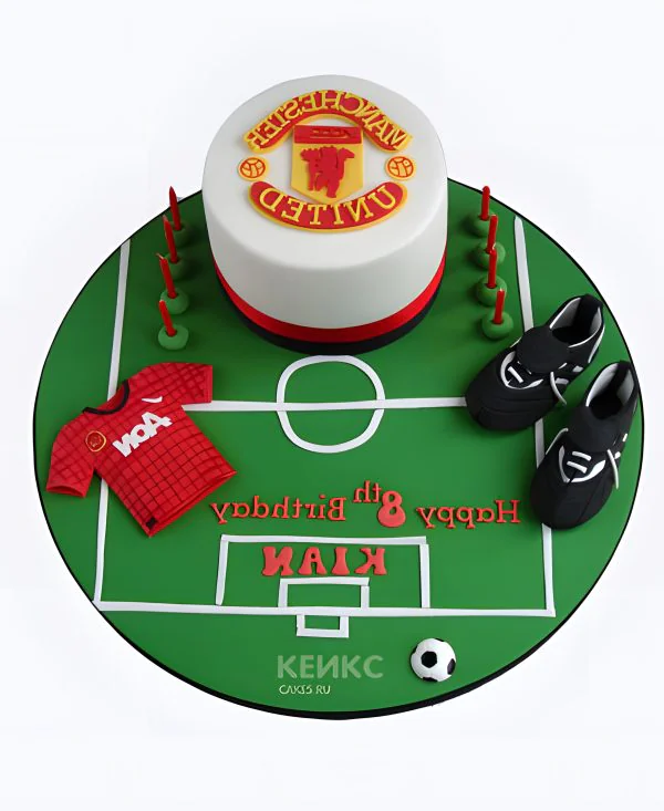 Торт в виде зеленого футбольного поля Торт в виде зеленого футбольного поля Фото