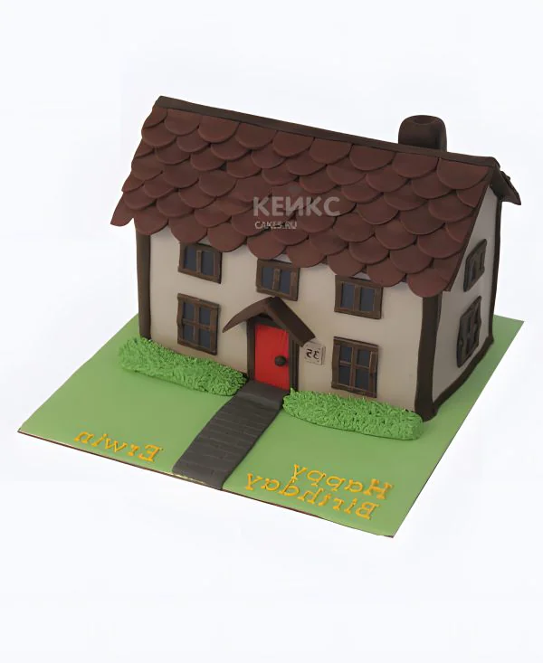 Торт в виде дома с зеленой травой Фото