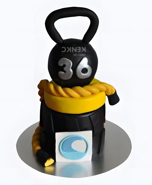 Черно-желтый торт гиря с веревкой Черно-желтый торт гиря с веревкой Фото