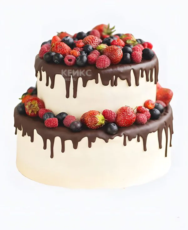 Двухэтажный торт с ягодами и шоколадными потеками Двухэтажный торт с ягодами и шоколадными потеками Фото