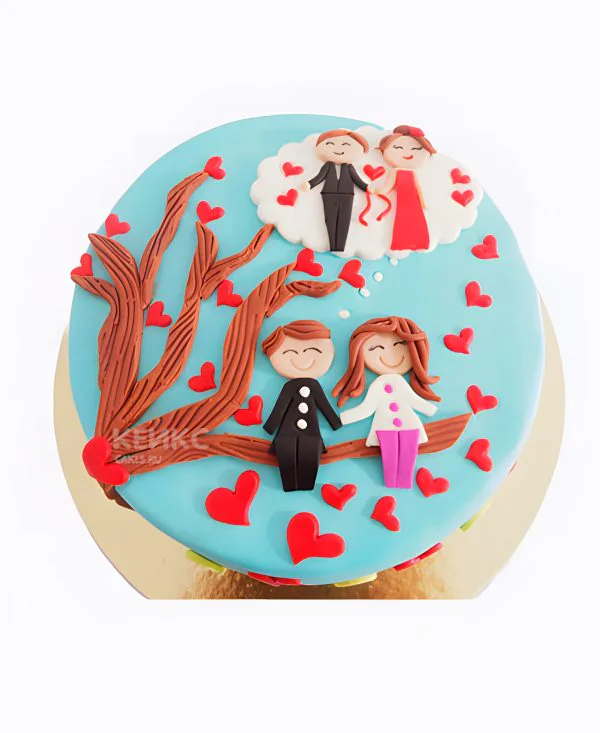Голубой торт с влюбленными на веточке Голубой торт с влюбленными на веточке Фото