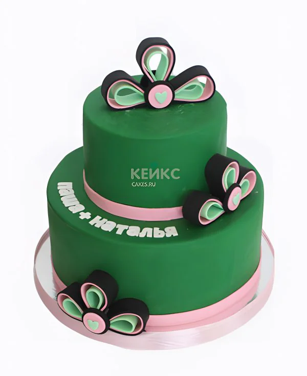 Двухъярусный зеленый торт Двухъярусный зеленый торт Фото